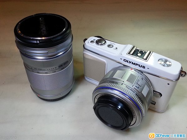 Olympus E-P1 body + 14-42 & 40-150 Lens.