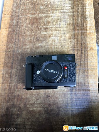 Minolta CLE body + M-Rokkor 28/2.8 + hand grip