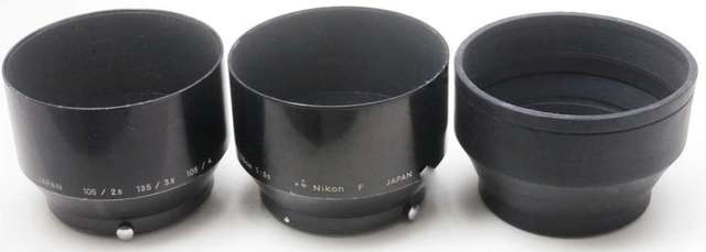 Nikon(HS-4 及 F)共三個遮光罩(兩個金屬一個橡膠)適合配52mm口徑嘅105至135mm焦距鏡頭。實用抵玩