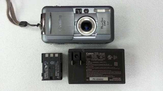 Canon Power Shot S40 數碼相機 (冇電池/CF card/mon 花)